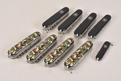 Lot 827 - Four Victorinox Pocket Knives/Multi-Tools