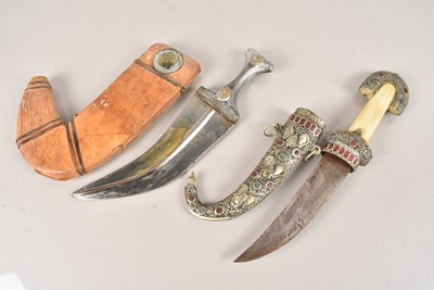 Lot 830 - A Middle Eastern Jambiya