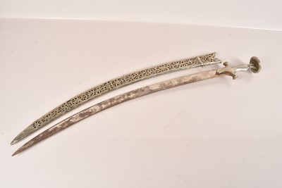 Lot 909 - A Middle Eastern White Metal Talwar