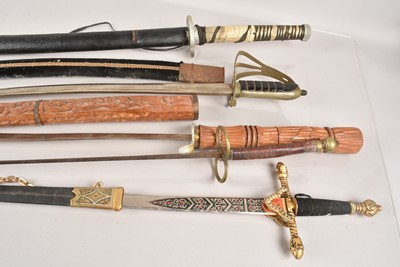 Lot 916 - A group of Five Reproduction Display Swords