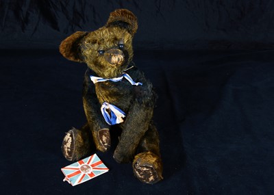 Lot 59 - A rare Chad Valley 1920s black mohair Smiler teddy bear with provenance