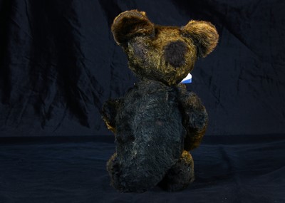 Lot 59 - A rare Chad Valley 1920s black mohair Smiler teddy bear with provenance
