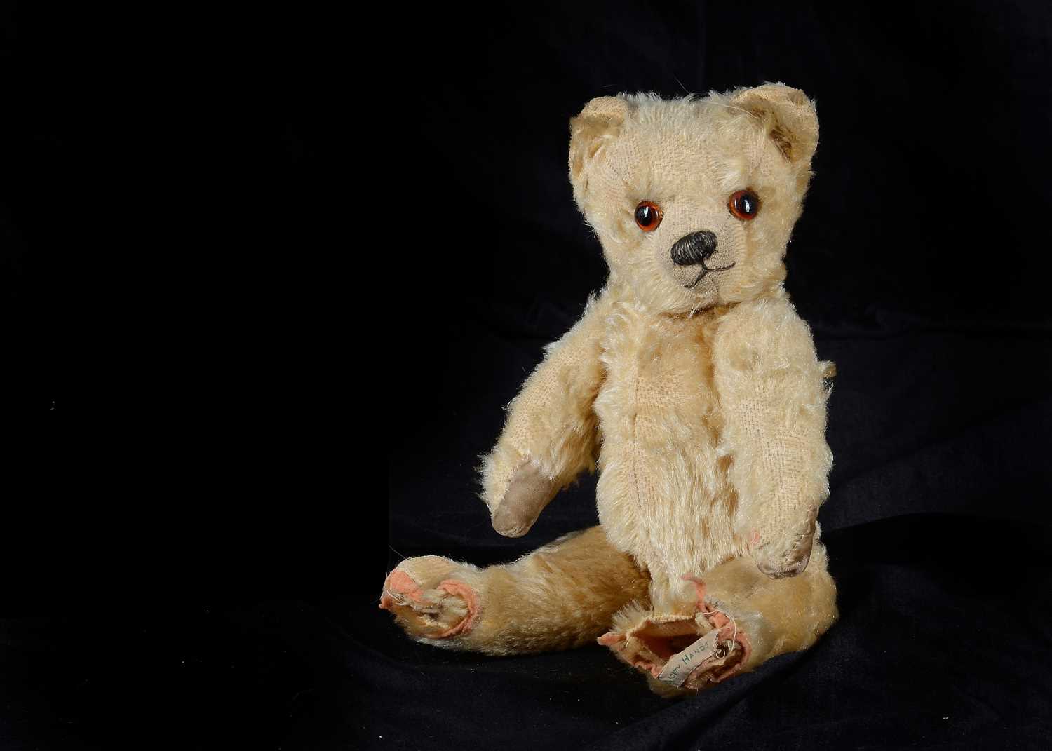 Lot 64 - Ardua, a Chad Valley teddy bear which escaped the invasion of Singapore in 1942