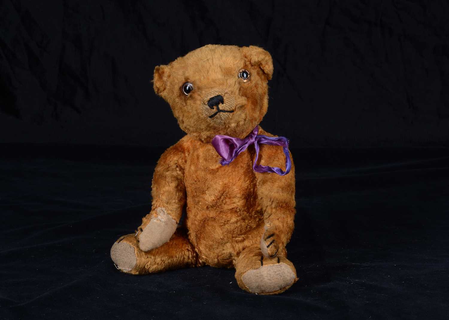 Lot 95 - An 1930s Omega orange artificial silk plush teddy bears