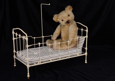 Lot 98 - A 1930s Chad Valley teddy bear and cot