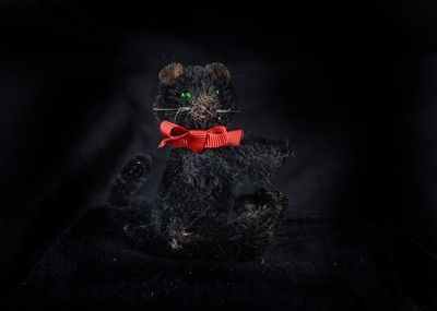 Lot 131 - A rare British ‘soldier’ lucky black cat