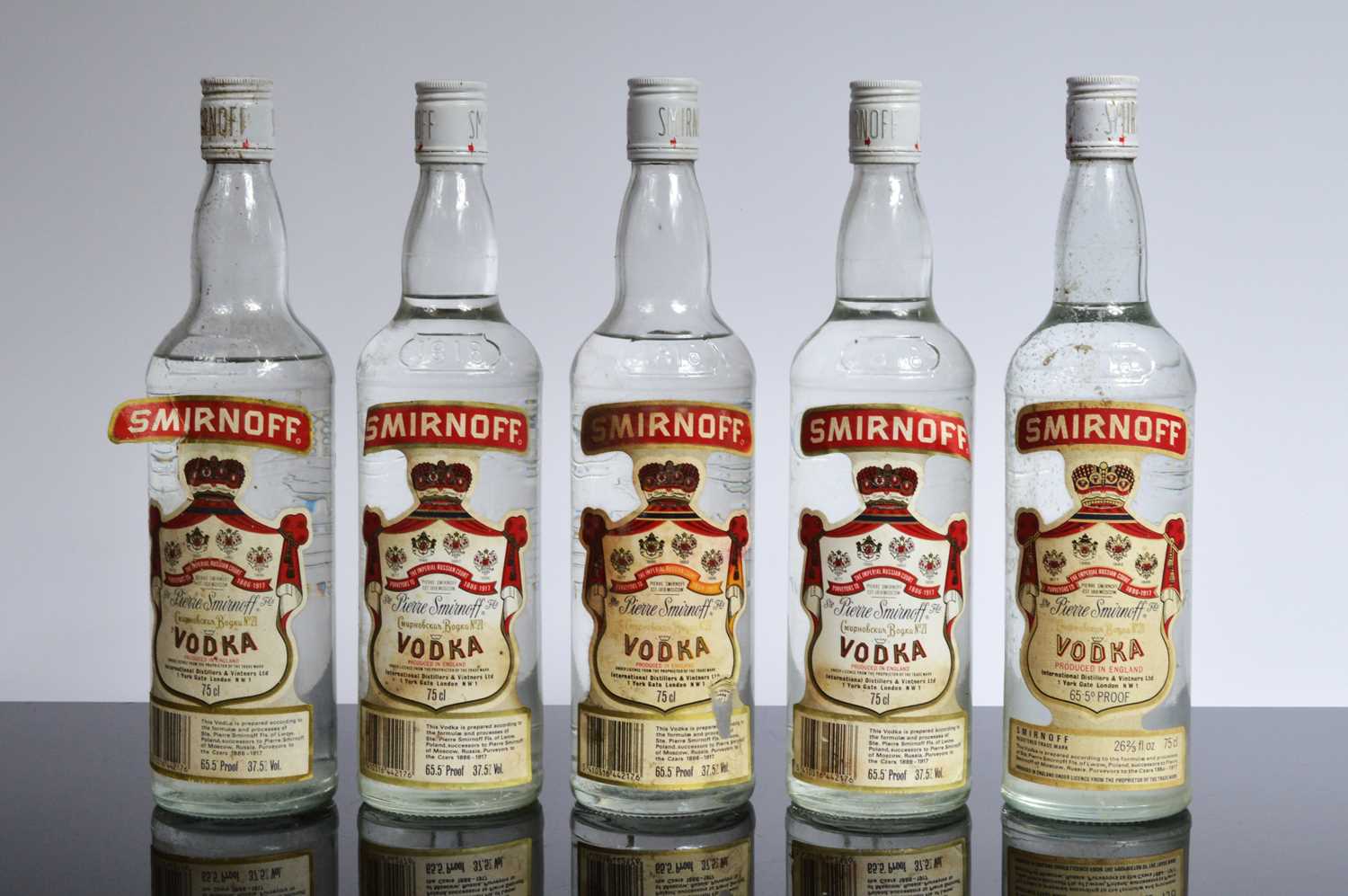 Lot 34 - A collection of five Smirnoff Vodka