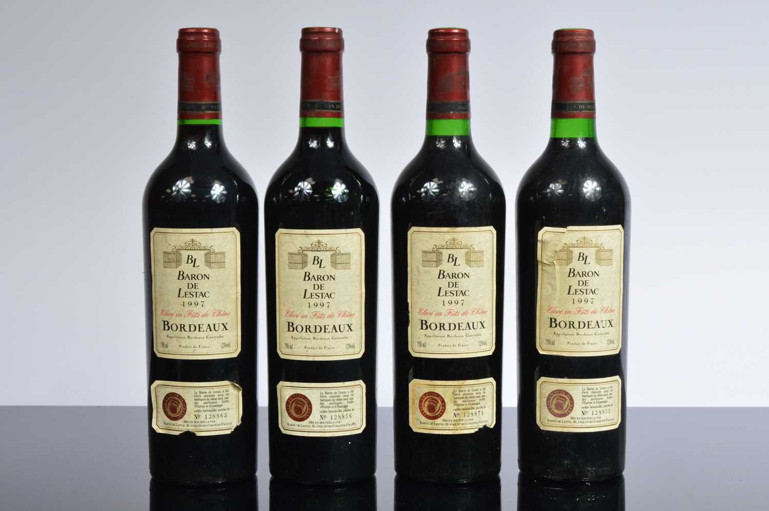 Lot 45 - Four bottles of Baron De Lestac 1997