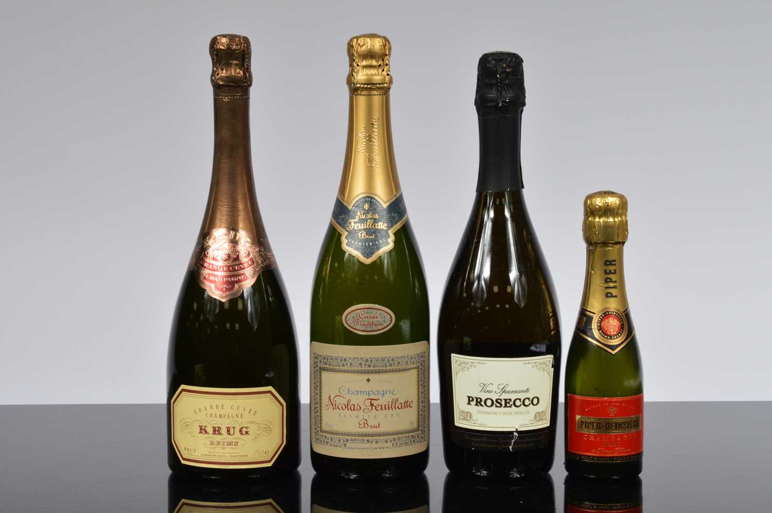 Lot 77 - Four bottles of Champagne and Prosecco