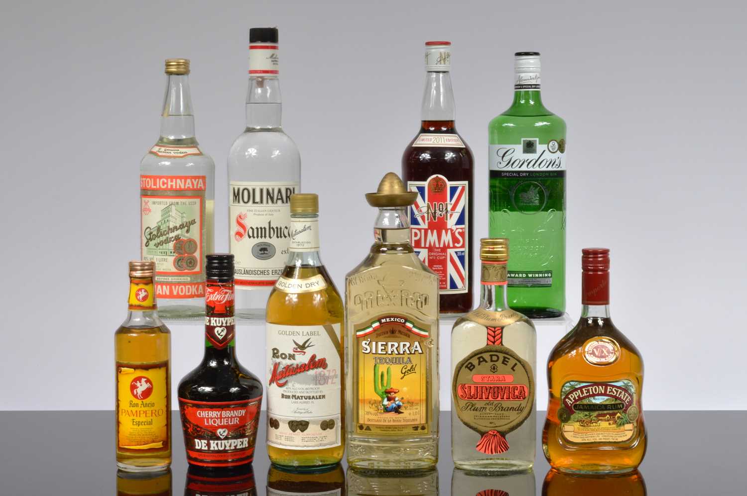 Lot 83 - A mixed collection of ten bottle of spirits