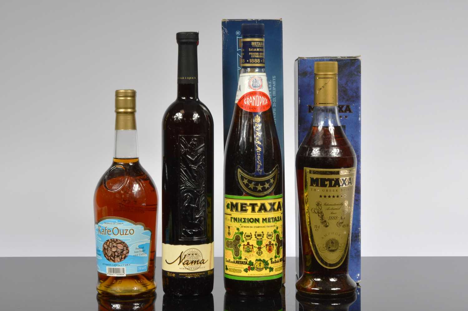 Lot 84 - A collection of four Greek spirits