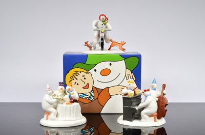 Lot 87 - A collection of three large Coalport Snowman figurines