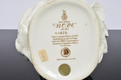 Lot 92 - A collection of three Royal Doulton NSPCC figurines