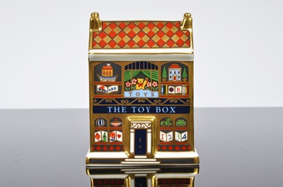 Lot 95 - A set of three Royal Crown Derby mini houses