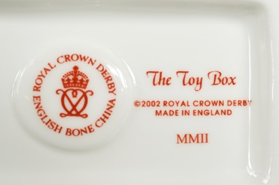 Lot 95 - A set of three Royal Crown Derby mini houses