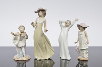 Lot 96 - A collection of four modern NAO porcelain figures
