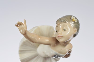 Lot 96 - A collection of four modern NAO porcelain figures