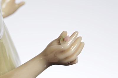 Lot 96 - A collection of four modern NAO porcelain figures