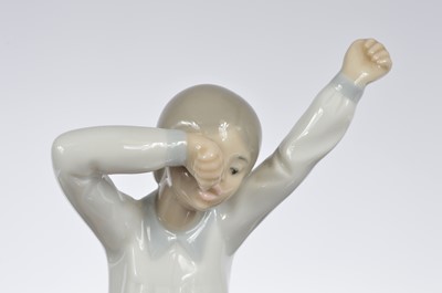 Lot 96 - A collection of four modern NAO porcelain figures