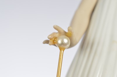 Lot 96 - A collection of four modern NAO porcelain figures