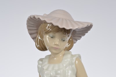 Lot 96 - A collection of four modern NAO porcelain figures