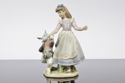 Lot 97 - A Lladro porcelain Alice in Wonderland figural group