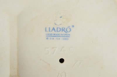 Lot 97 - A Lladro porcelain Alice in Wonderland figural group