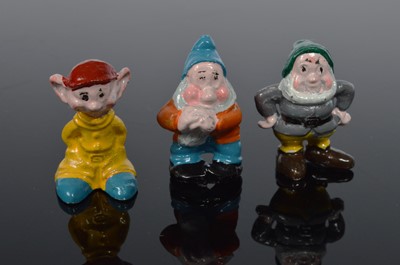 Lot 101 - A set of Snow white and the Seven Dwarfs ceramic miniature figures