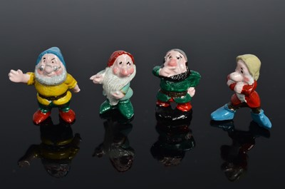 Lot 101 - A set of Snow white and the Seven Dwarfs ceramic miniature figures