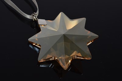 Lot 117 - Four Swarovski Christmas tree ornaments