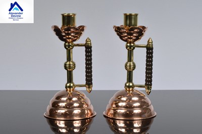 Lot 145 - A set of Copper and Brass Candlesticks