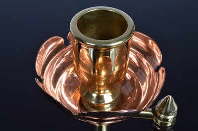 Lot 145 - A set of Copper and Brass Candlesticks