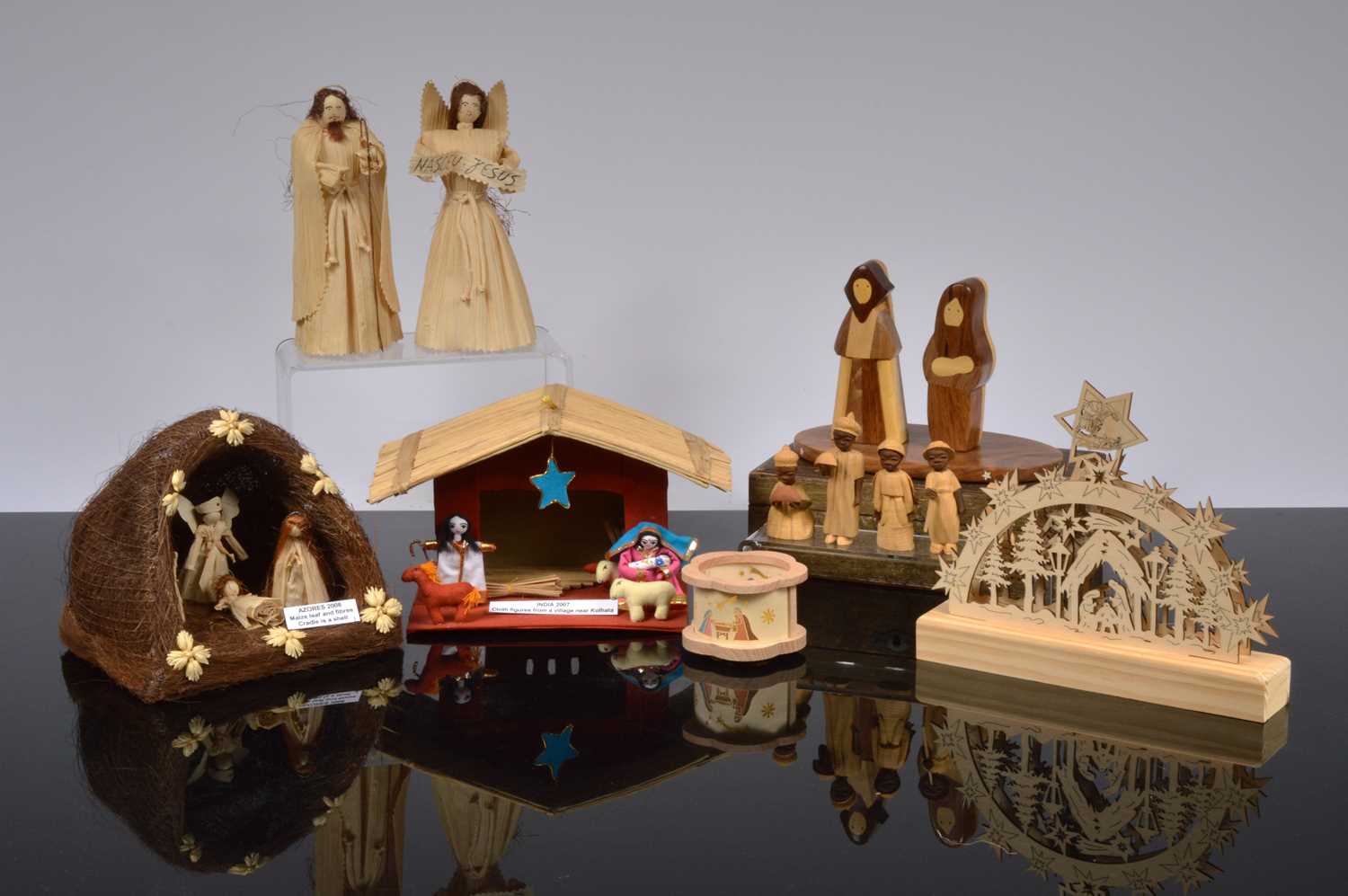 Lot 152 - A collection of seven wooden Nativity sets