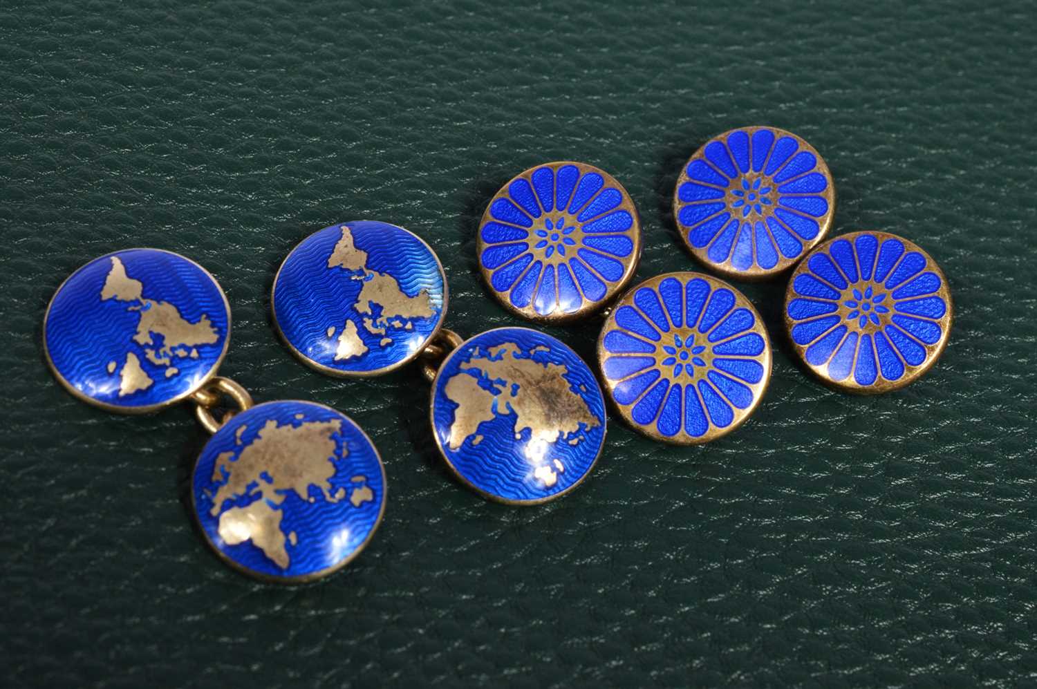 Lot 156 - Two pairs of gold and enamelled cufflinks