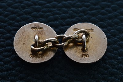 Lot 156 - Two pairs of gold and enamelled cufflinks