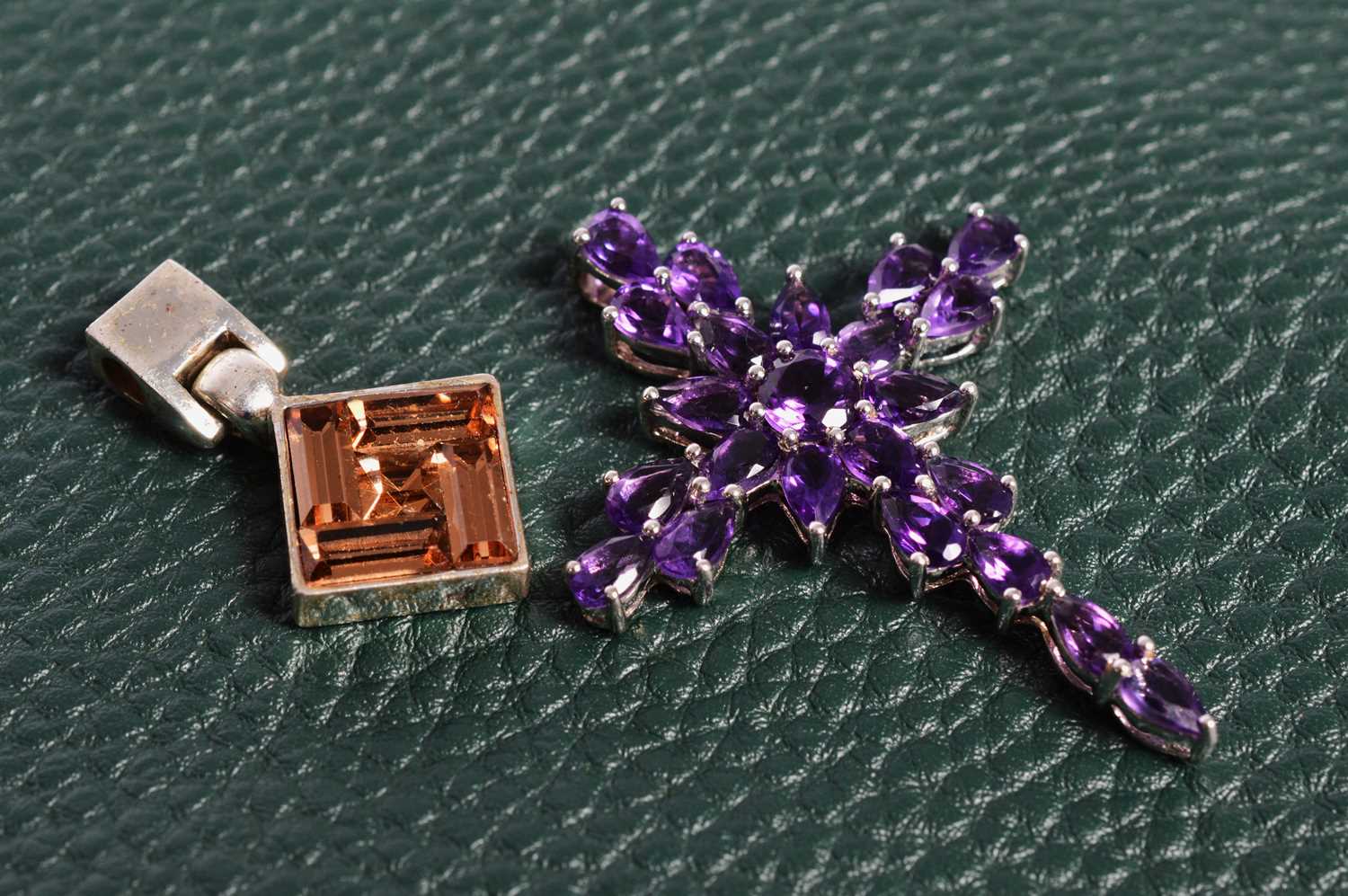 Lot 160 - A Sterling Silver and Amethyst cross pendant