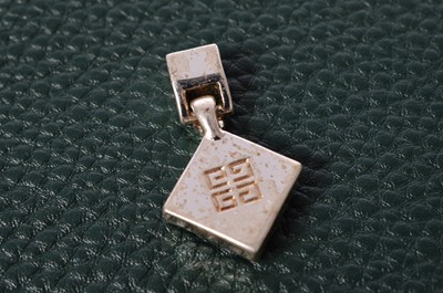 Lot 160 - A Sterling Silver and Amethyst cross pendant