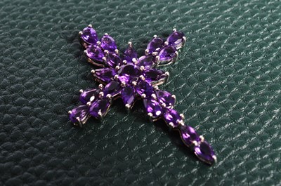 Lot 160 - A Sterling Silver and Amethyst cross pendant