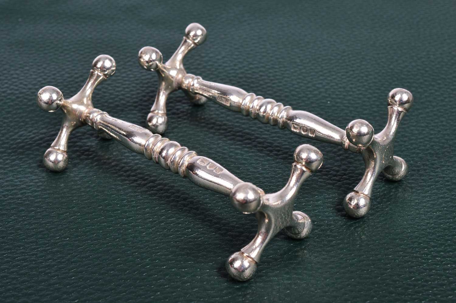 Lot 162 - Two Victorian Silver knife rests