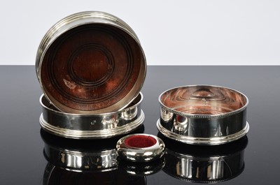 Lot 165 - A pair of Wine bottle coasters