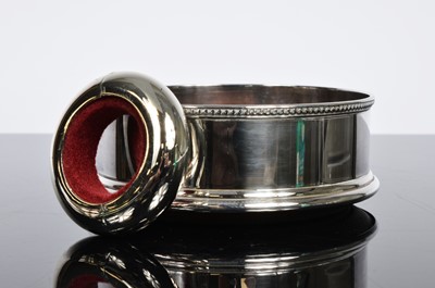 Lot 165 - A pair of Wine bottle coasters