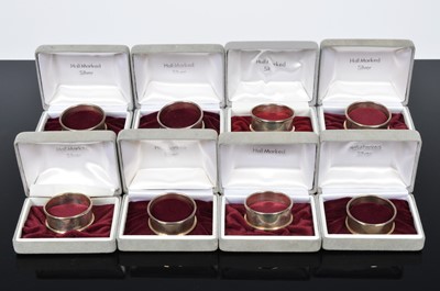 Lot 166 - A set of eight Silver napkin rings