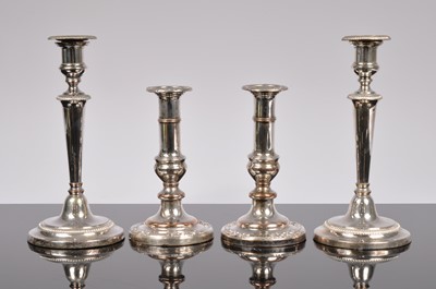 Lot 177 - Four silver plated candle sticks
