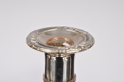 Lot 177 - Four silver plated candle sticks