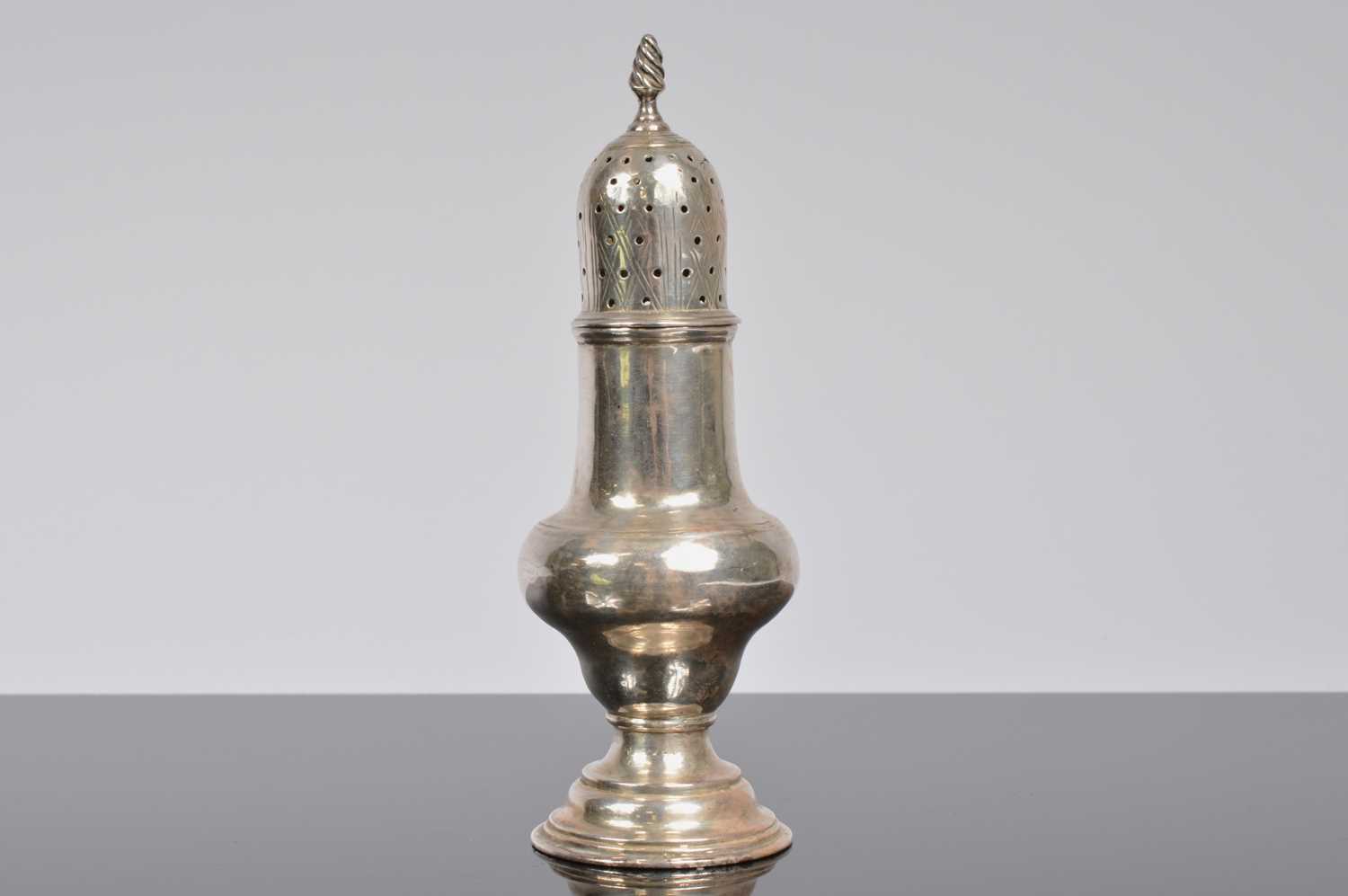 Lot 179 - A Georgian Style sugar sifter
