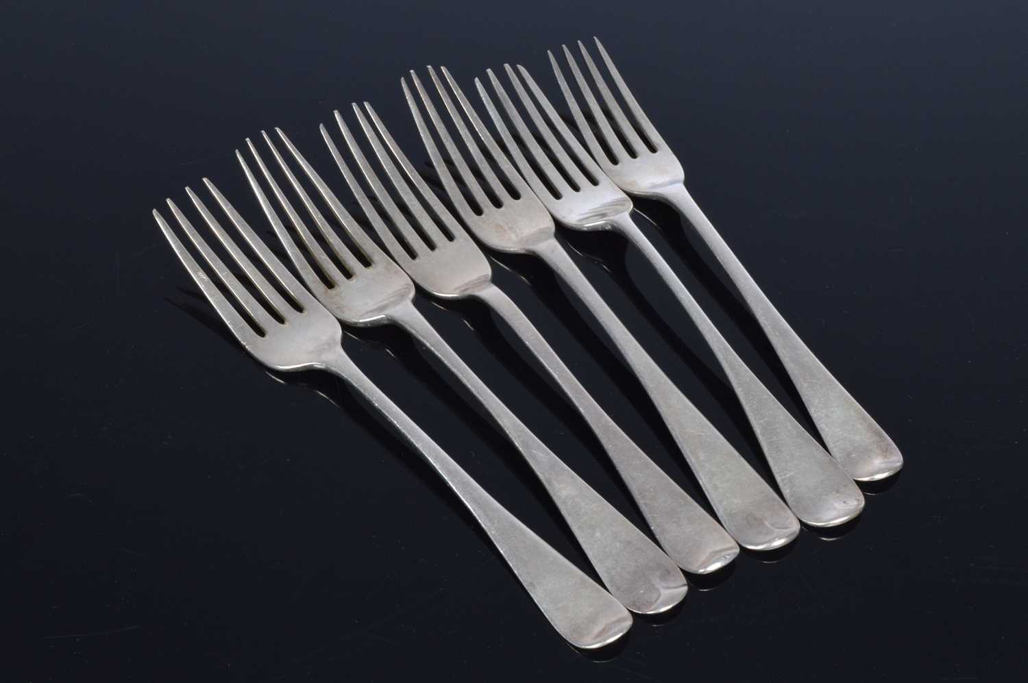 Lot 184 - A set of six Georgian harlequined silver desert forks