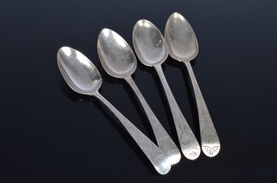 Lot 185 - A set of four Georgian bright cut tablespoons