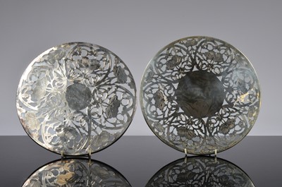 Lot 187 - A set of ten sterling silver and glass trivets