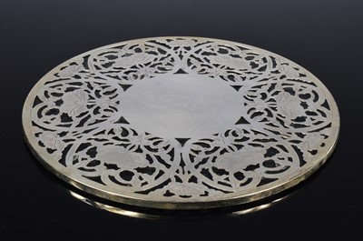 Lot 187 - A set of ten sterling silver and glass trivets