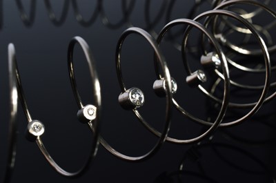 Lot 191 - A German white metal and diamond spiral spring choker necklace